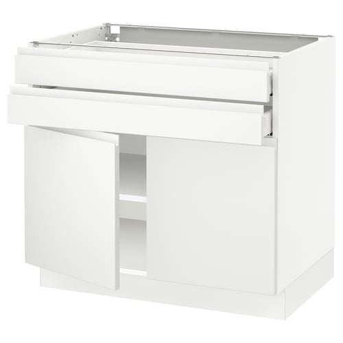 Modern white kitchen unit with sleek design and integrated handles.