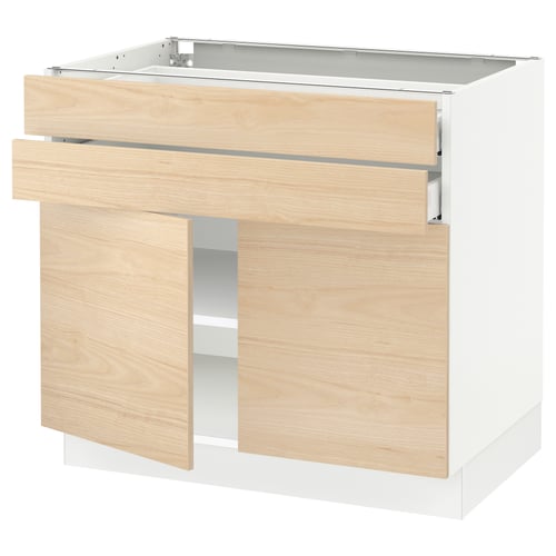 SEKTION kitchen cabinet with light ash wood drawers and white base.