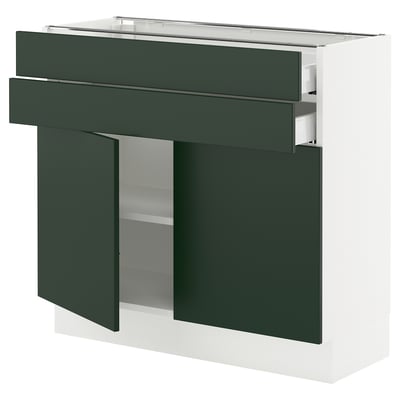 This image shows an ikea SEKTION kitchen cabinet in white with dark green havstorp fronts, featuring a smooth drawer and an open shelf.