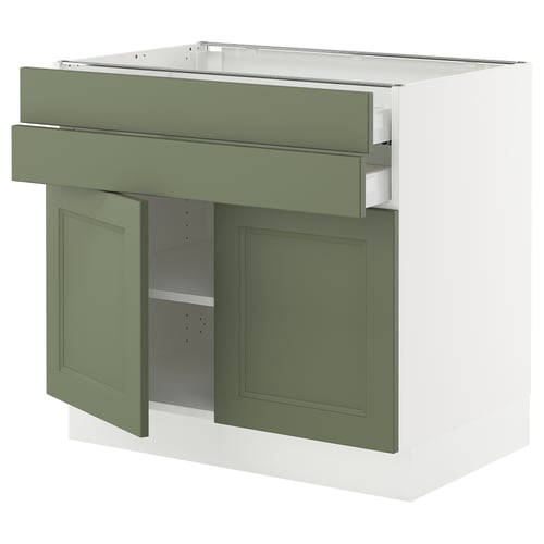 Olive green and white SEKTIONs kitchen cabinet with open doors and drawer.