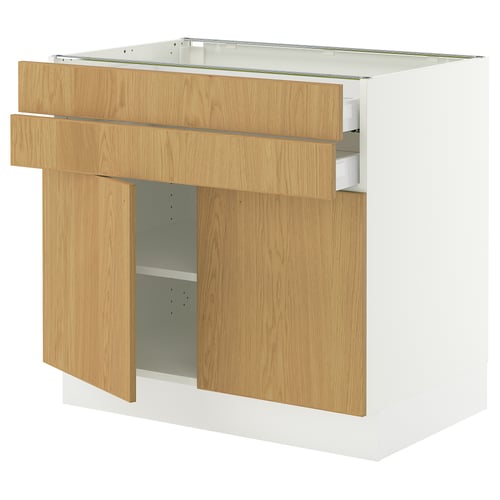 An IKEA SEKTION kitchen unit. It oak veneer with solid wood edges and white cabinet frames. The design includes drawers and adjustable shelves.