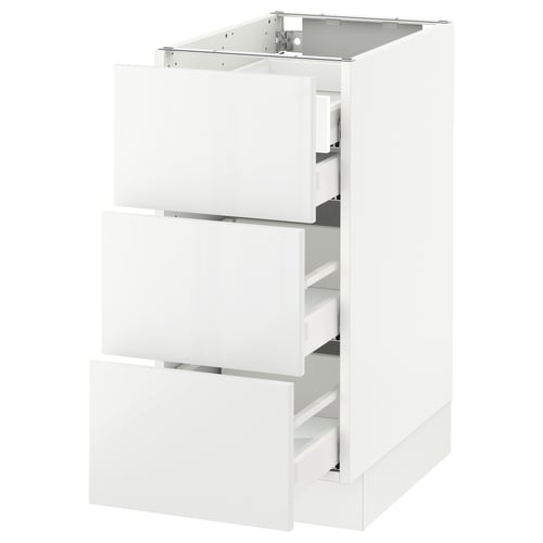 White SEKTION kitchen cabinet with three glossy drawers, modern design.