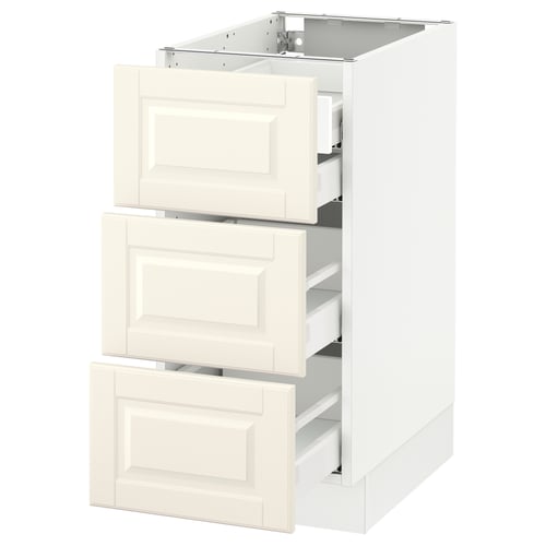 A white SEKTION kitchen cabinet with three open drawers, featuring a traditional design with off-white, bevelled fronts.