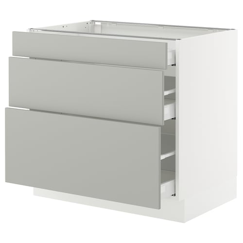A white SEKTION kitchen cabinet with grey havstorp drawers in a modern design.