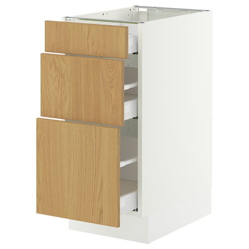 White SEKTION kitchen cabinet with oak drawers, three partially open
