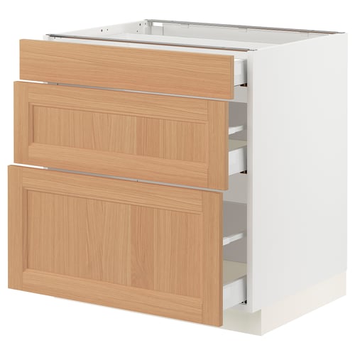 Ikea SEKTION: oak wood kitchen cabinet, 3 drawers open, white base, natural oak finish, rectangular design.
