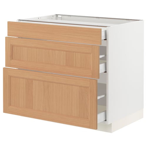SEKTION kitchen cabinet in oak wood with white base, three drawers.