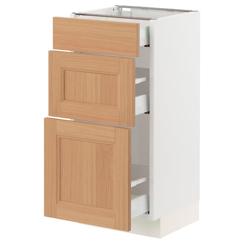 SEKTION kitchen unit with white base, oak doors and drawers.