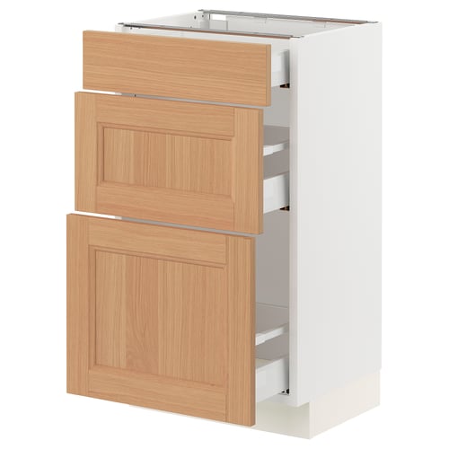 SEKTION white kitchen cabinet with oak drawers.