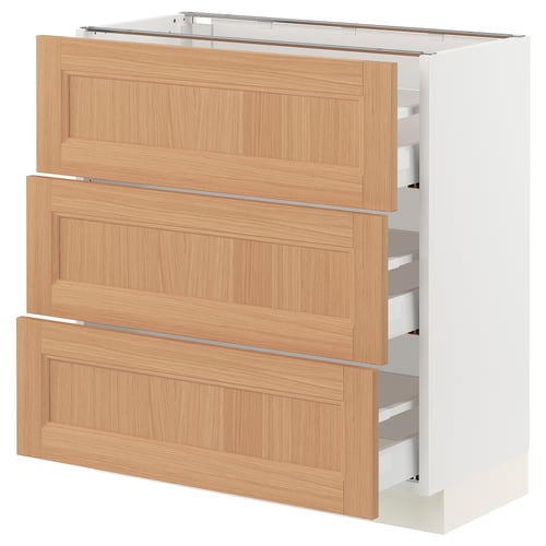 White SEKTION kitchen cabinet with three oak drawers.
