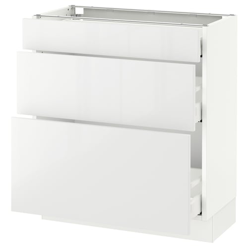 A white SEKTION kitchen cabinet with modern design. It has multiple drawers with high-gloss fronts.