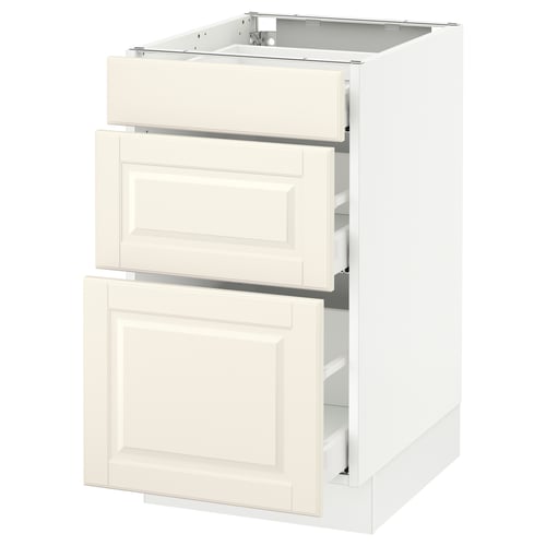 A white SEKTION kitchen cabinet with three off-white drawers featuring bevelled edges.