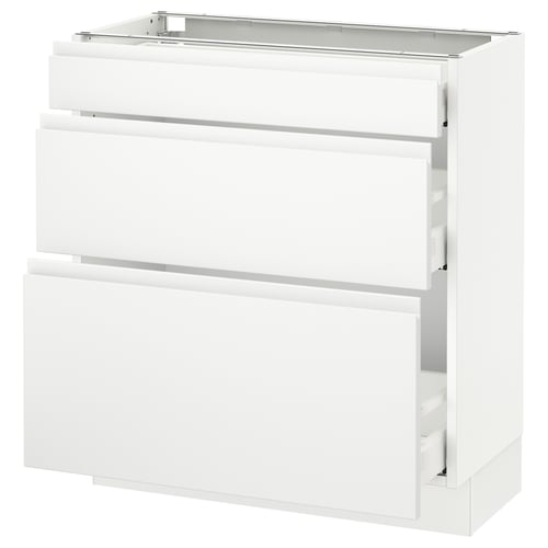 A white SEKTION kitchen cabinet with three drawers and a countertop. It has a sleek, modern design with smooth drawer faces and integrated handles.
