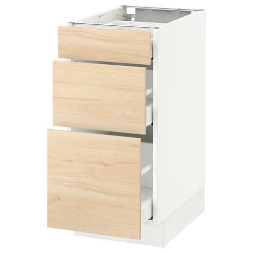 A white SEKTION kitchen cabinet with three light ash wooden drawers.