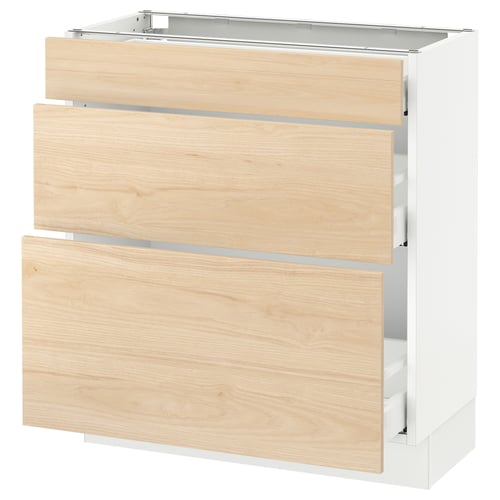 An ikea SEKTION kitchen cabinet with light-colored wooden drawers and a white frame.