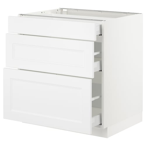 An ikea SEKTION white kitchen cabinet with multiple drawers.