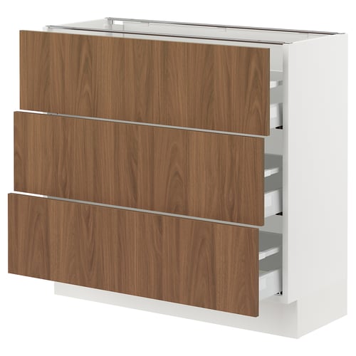 Modern kitchen cabinet, white with walnut drawers, three large drawers, sleek design.