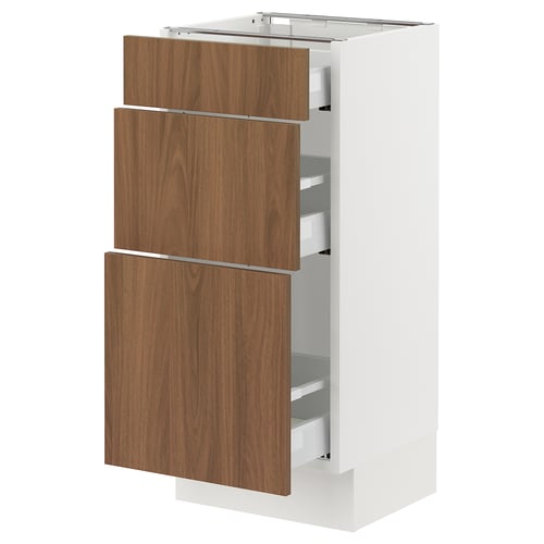 White kitchen cabinet with three walnut drawers, sleek and modern design.