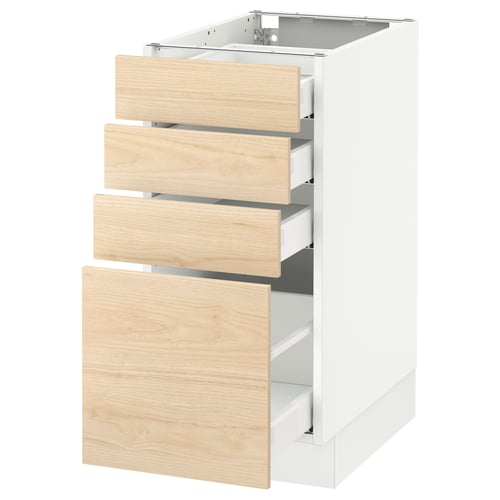 An ikea SEKTION kitchen cabinet with light ash drawers and white base.