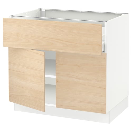 Wooden kitchen cabinet unit with light ash finish and white frame, featuring drawers and adjustable shelves.