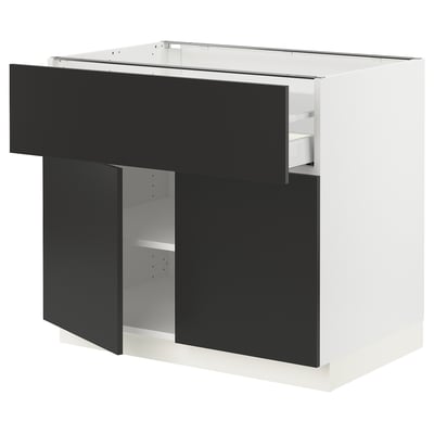 SEKTION kitchen cabinet in black with white interior, adjustable shelves, and subtle modern design.