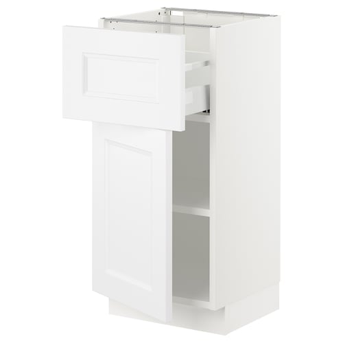 White SEKTION kitchen cabinet with pullout shelf and drawer.