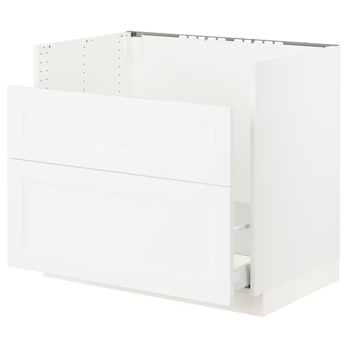 A white SEKTION kitchen cabinet with smooth, glossy doors and a drawer. It a modern, clean design and is made from particleboard and fiberboard.