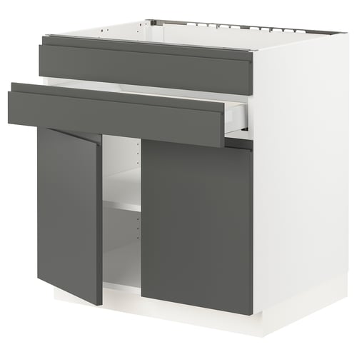 An assembled modular kitchen unit named SEKTION with dark grey handles and a white frame.