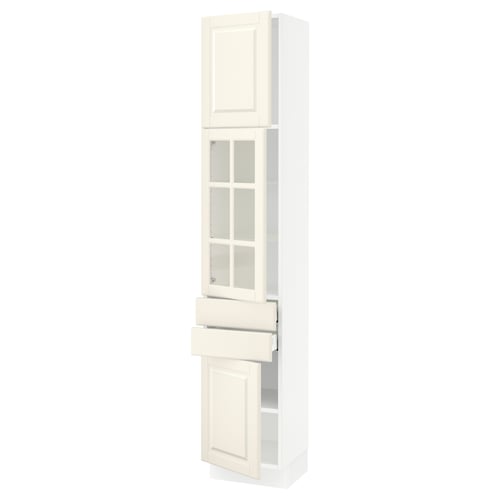 White kitchen cabinet with glass doors, two drawers, and adjustable shelves. Traditional design with bevelled edges.