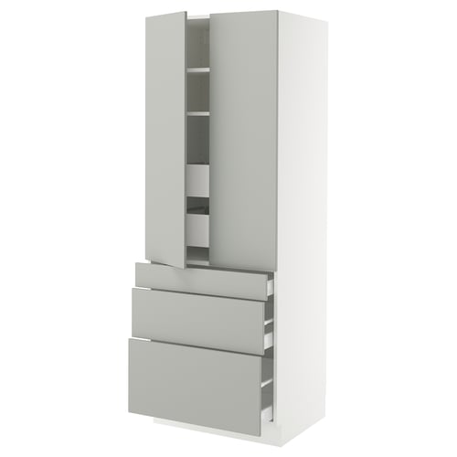 A white SEKTION kitchen cabinet with grey drawers. It has two doors and four drawers, featuring a sleek, modern design.