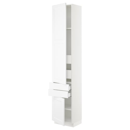 A white SEKTION tall kitchen cabinet with adjustable shelves and integrated drawers. The sleek and modern design ensures practical storage.