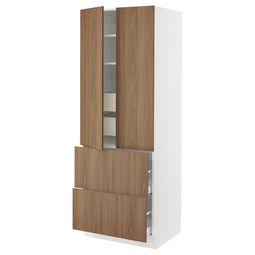 SEKTION kitchen cabinet. Tall white unit with walnut doors. Shelves and drawers with smooth, modern design.