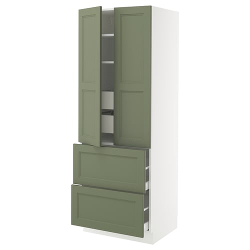 Green cabinet with pullout shelves and drawers.