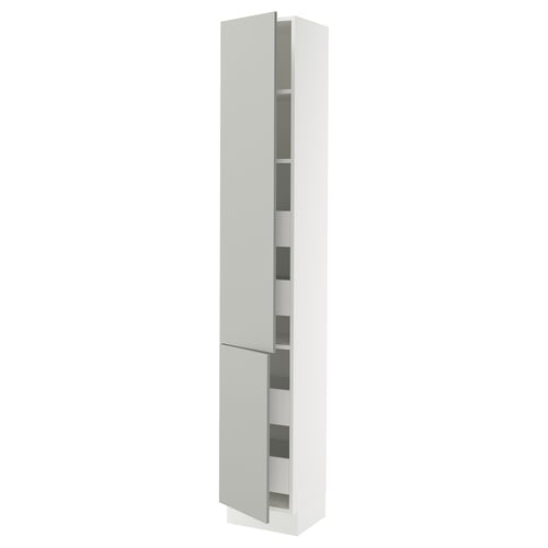 A tall white cabinet with dual doors and adjustable shelves, part of the SEKTION kitchen system. It has a modern, clean design.