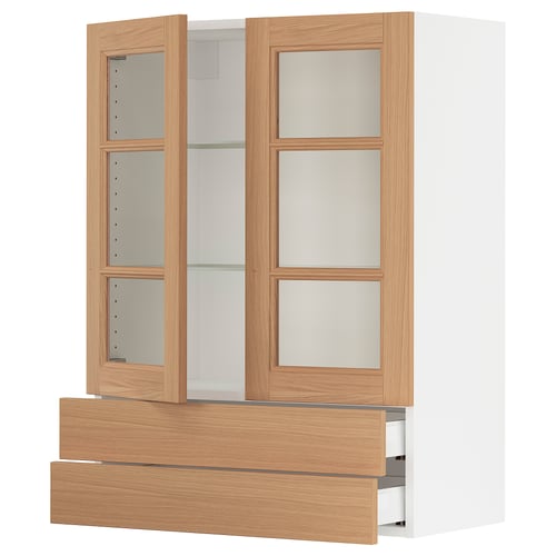 SEKTION kitchen cabinet in oak with glass doors.