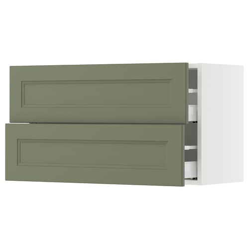 Image gray-green SEKTION kitchen drawers. Two open drawers show soft-close runners.