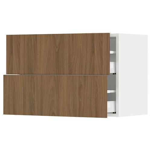 Depicts a modern kitchen cabinet system named SEKTION with wooden walnut fronts, featuring smooth surfaces and a sleek design.