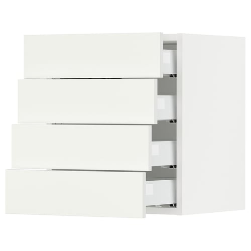 White SEKTION kitchen storage units with sleek, modern design and multiple drawers.