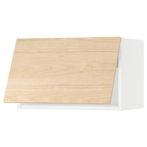 Woodgrain kitchen cabinet with slanted top, light wood finish.