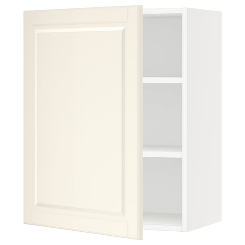 An off-white SEKTION kitchen cabinet with one door open, revealing adjustable shelves.