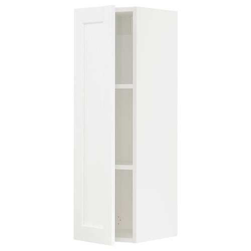 White SEKTION kitchen cabinet with one open door, minimalist design.