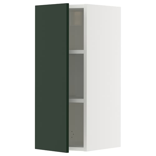 Ikea SEKTION kitchen cabinet in deep green with white frame, rectangular shape, and adjustable shelves.