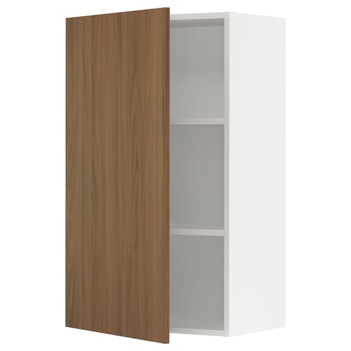 A modern, white SEKTION kitchen cabinet with a wooden front door in walnut finish. It an adjustable shelf inside and a gentle closing hinge.
