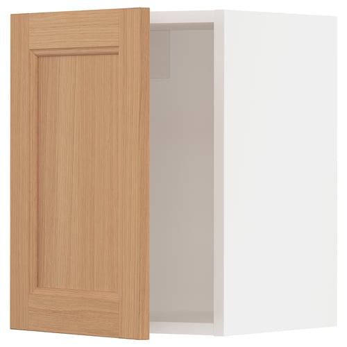 A light wood-colored kitchen cabinet door with a simple rectangular design. It a sturdy frame and natural oak grain.