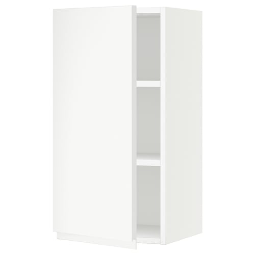 White SEKTION kitchen cabinet with shelves, modern minimalist design.