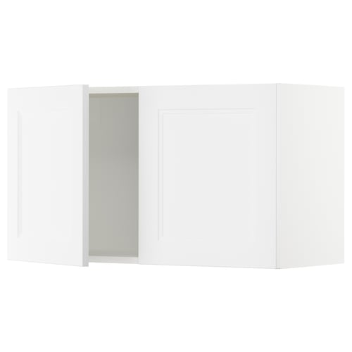 White SEKTION kitchen cabinet with open door.
