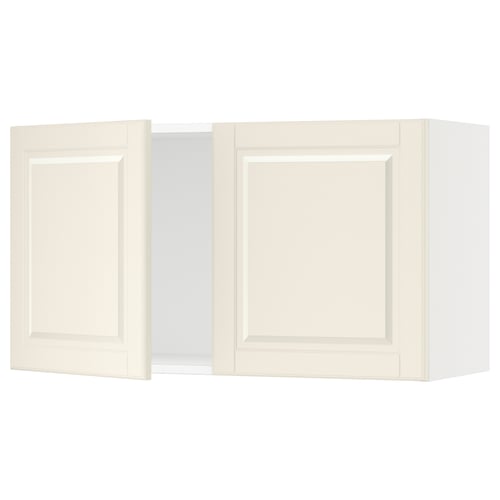 An off-white SEKTION kitchen wall cabinet with two doors, featuring a traditional design with bevelled edges.