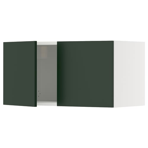 A green ikea SEKTION kitchen cabinet. Its rectangular, with a smooth finish, and a door with a hidden hinge design.
