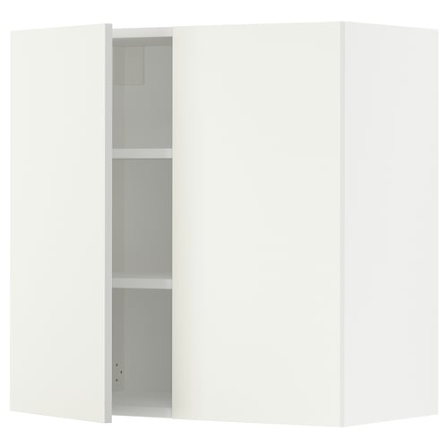 A white ikea SEKTION wall cabinet with one open door revealing shelves.