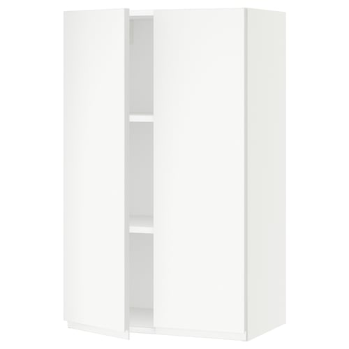A white SEKTION kitchen cabinet with adjustable shelves and a soft-closing door.